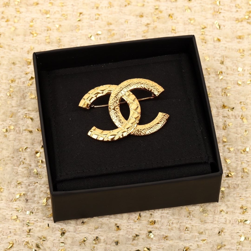 Ch**el brooches